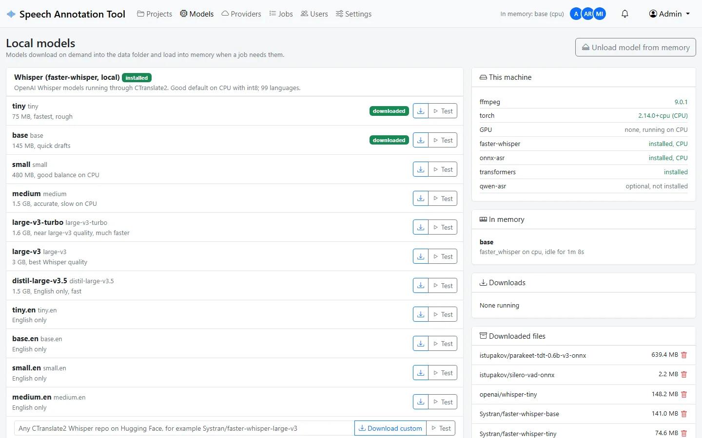 Models page listing Whisper sizes with download and test buttons, machine capabilities and downloaded files